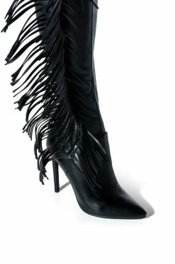 AZALEA WANG RIDE AT DAWN BELTED THIGH HIGH STILETTO FRINGE CHAP BOOT WITH 4 WAY STRETCH -AZALEA WANG SHOP azalea wang ride at dawn belted thigh high stiletto fringe chap boot black 5 5